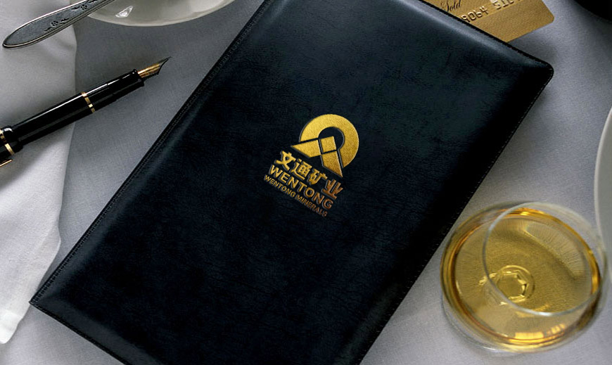 青海文通礦業有限公司標志設計在筆記本上的應用規范